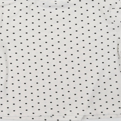 Brand and care label for Primark girls’ white polka dot pullover sweatshirt, size 7-8, years
