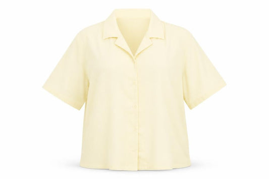 Front view of Damart women’s yellow polyester basic button-up, size UK 18, collared