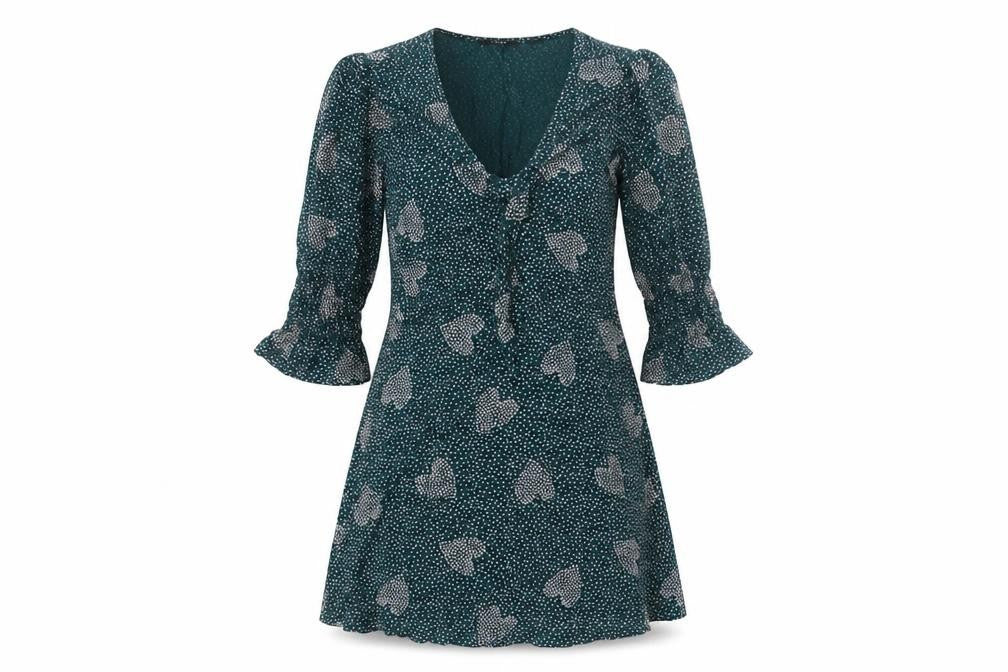 Front view of Lola Skye women’s green viscose fit & flare, size UK 8, v-neck pullover - hearts