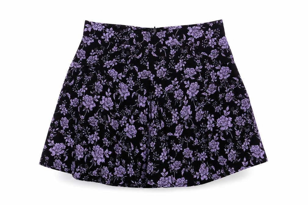 Front view of Preworn women’s black floral a-line skirt
