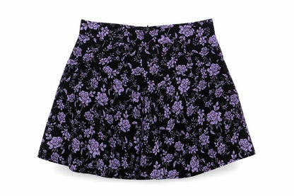 Front view of Preworn women’s black floral a-line skirt