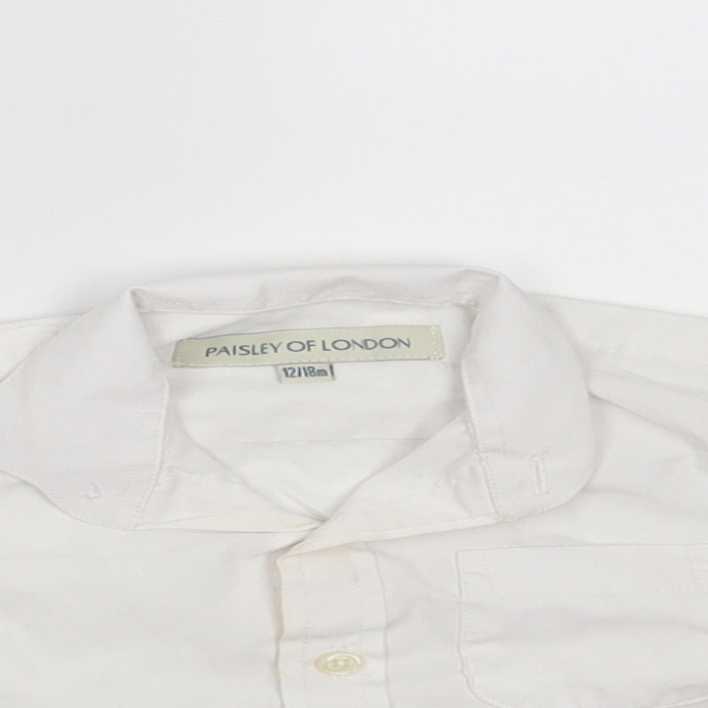Close-up detail of Paisely of London boys’ white polyester basic button-up, size 12-18, months collared button