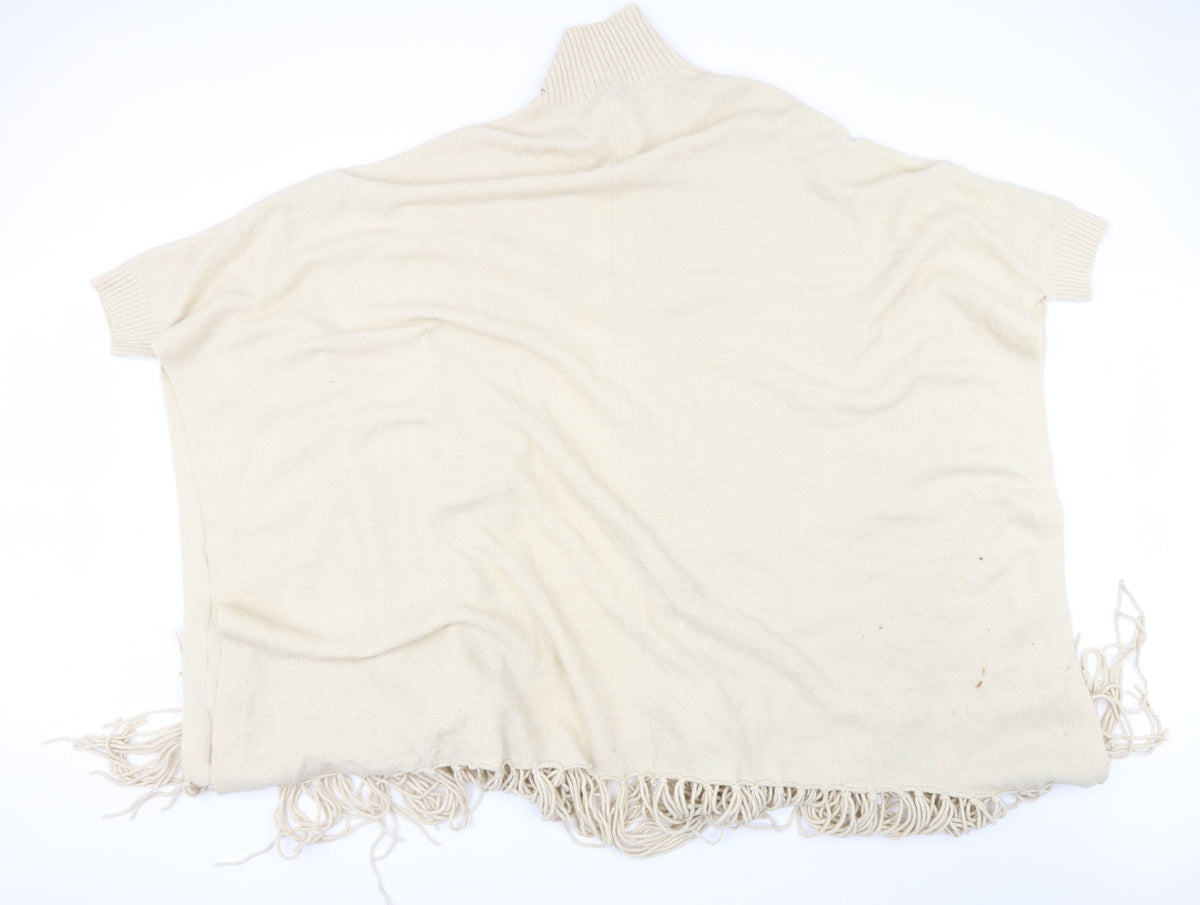 Back view of Riva women’s beige collared acrylic cape jumper, size S