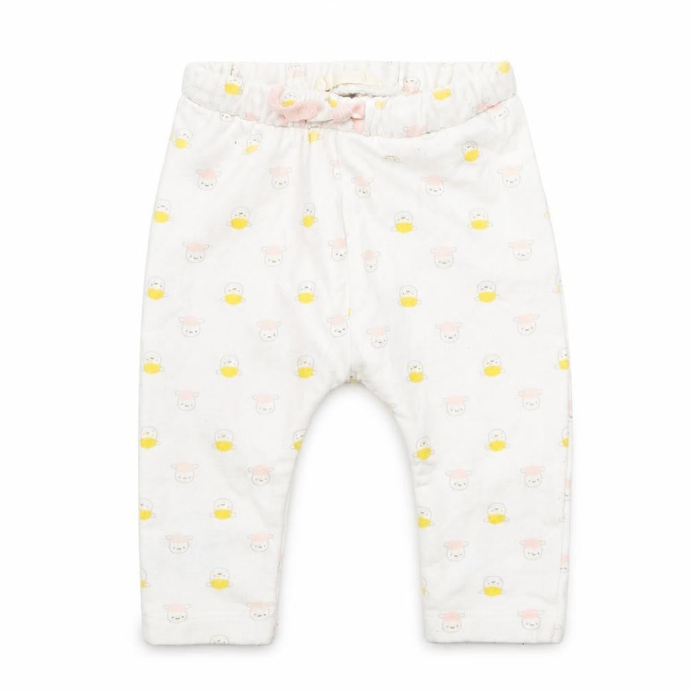 Front view of Preworn girls’ white cotton pyjama pants, size 3-6, months