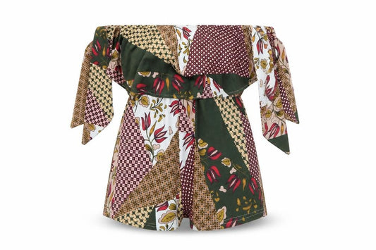 Front view of women’s green floral jumpsuit one-piece, size M