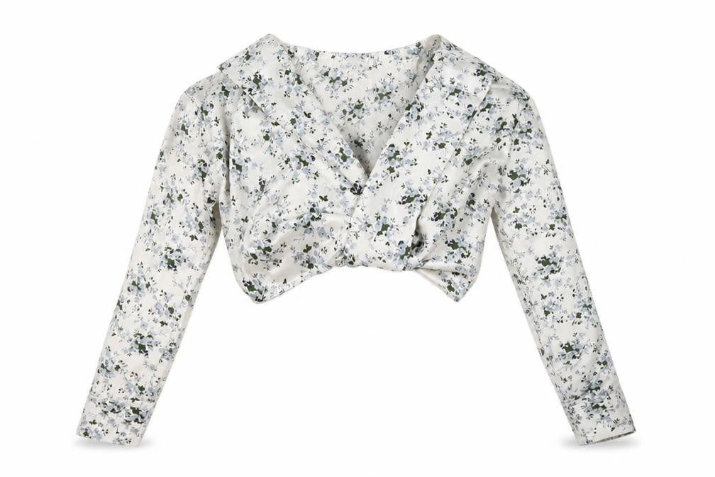 Front view of PRETTYLITTLETHING women’s white floral polyester cropped blouse, size UK 4, v-neck