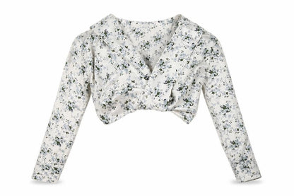 Front view of PRETTYLITTLETHING women’s white floral polyester cropped blouse, size UK 4, v-neck