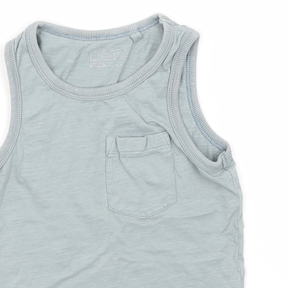 Close-up detail of Next boys’ green cotton basic tank, size 5, years round neck