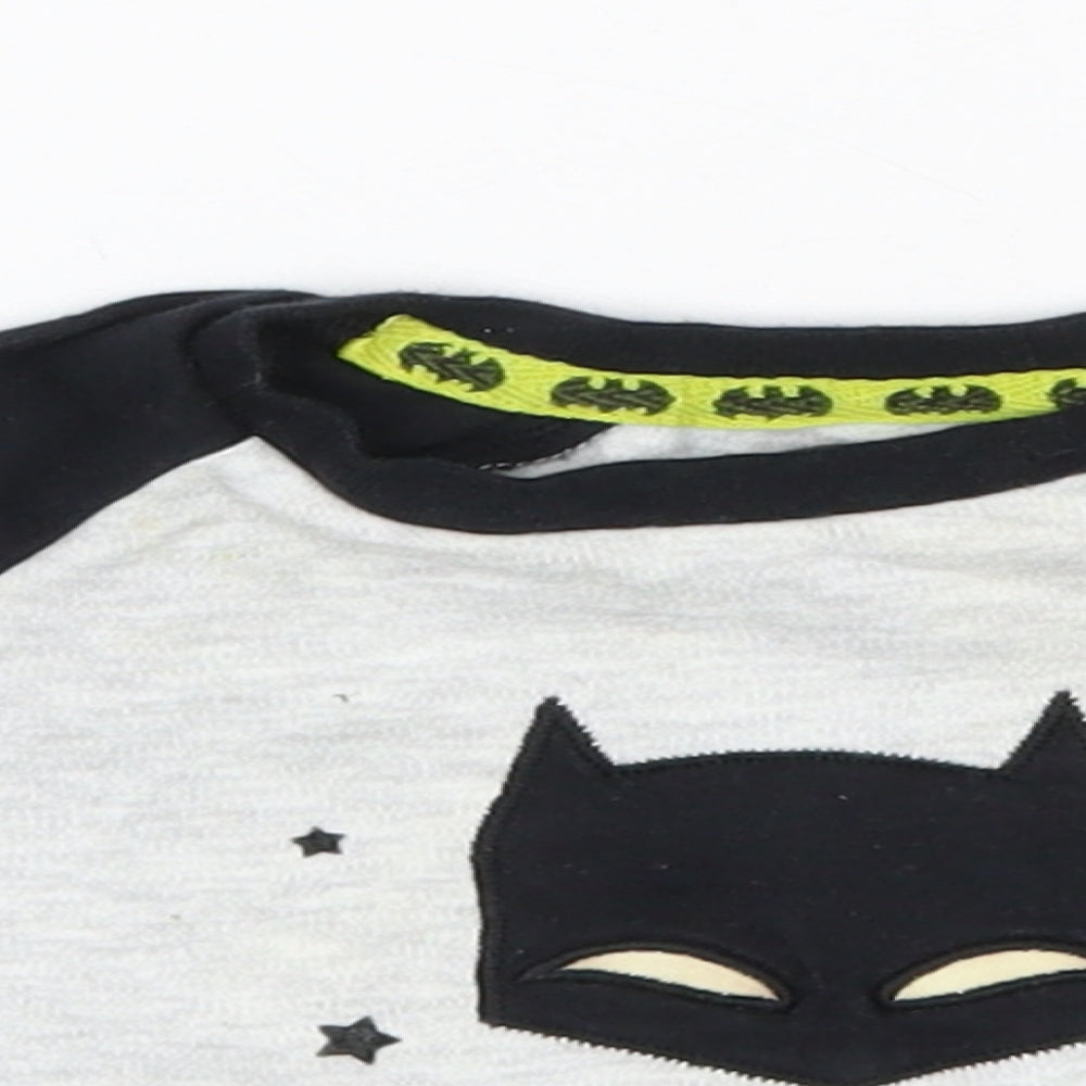 Close-up detail of Primark Baby Multicoloured Solid Cotton Pyjama Top, size 6-9, Months - Batman