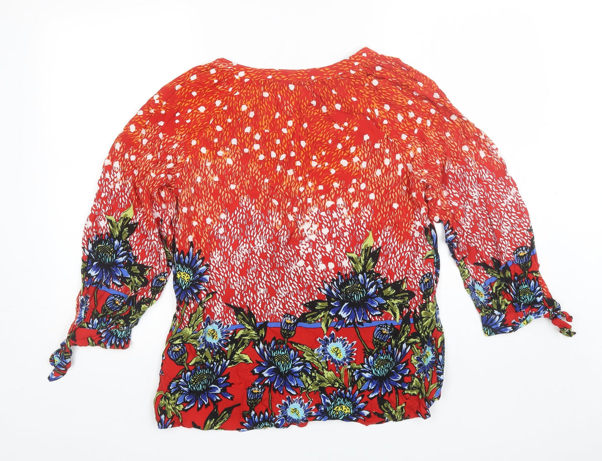 Back view of Figuerca & Flower women’s orange floral basic blouse, size XL, v-neck