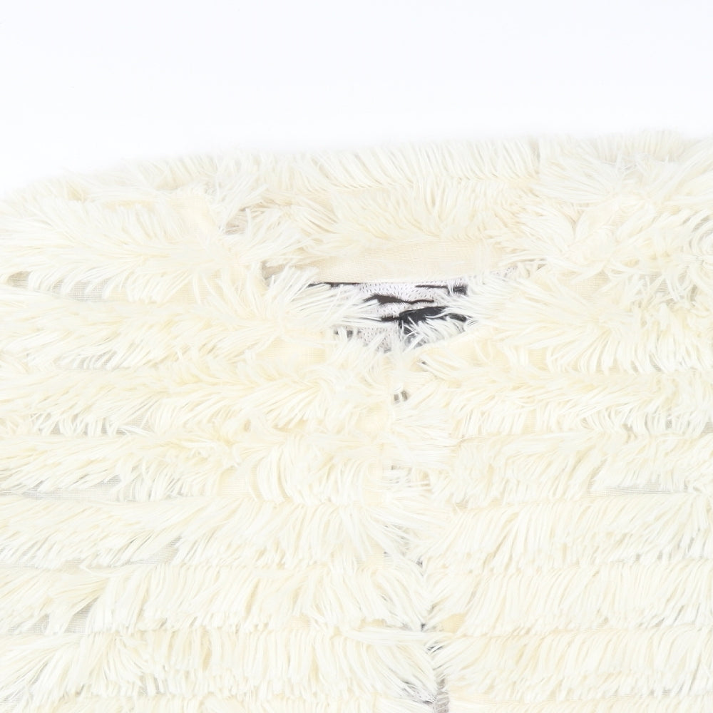 Close-up detail of INDULGENCE women’s white striped overcoat poncho, size UK 16