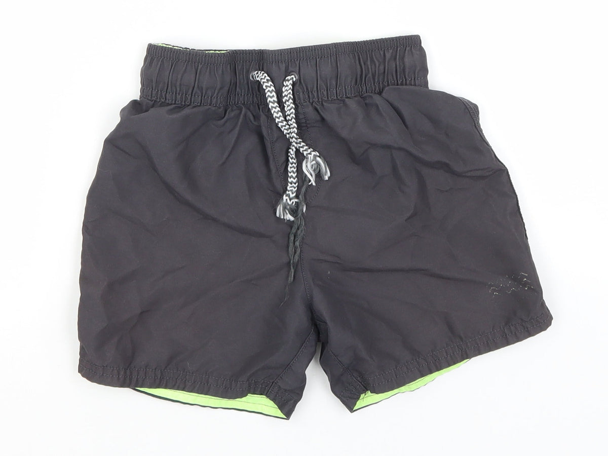 Additional front view of George boys’ green polyester utility shorts, size 6-7, years regular