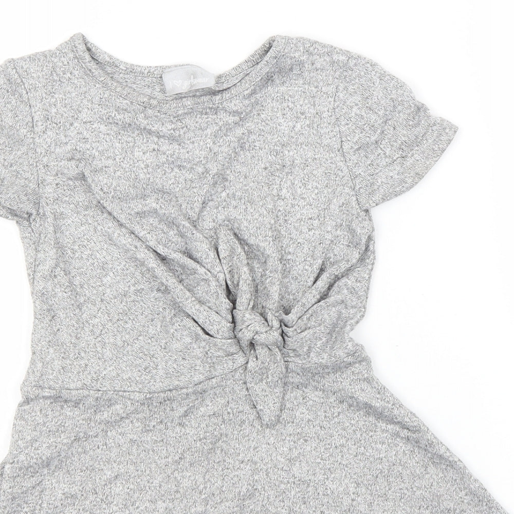 Close-up detail of Preworn girls’ silver a-line round neck