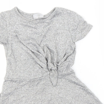 Close-up detail of Preworn girls’ silver a-line round neck