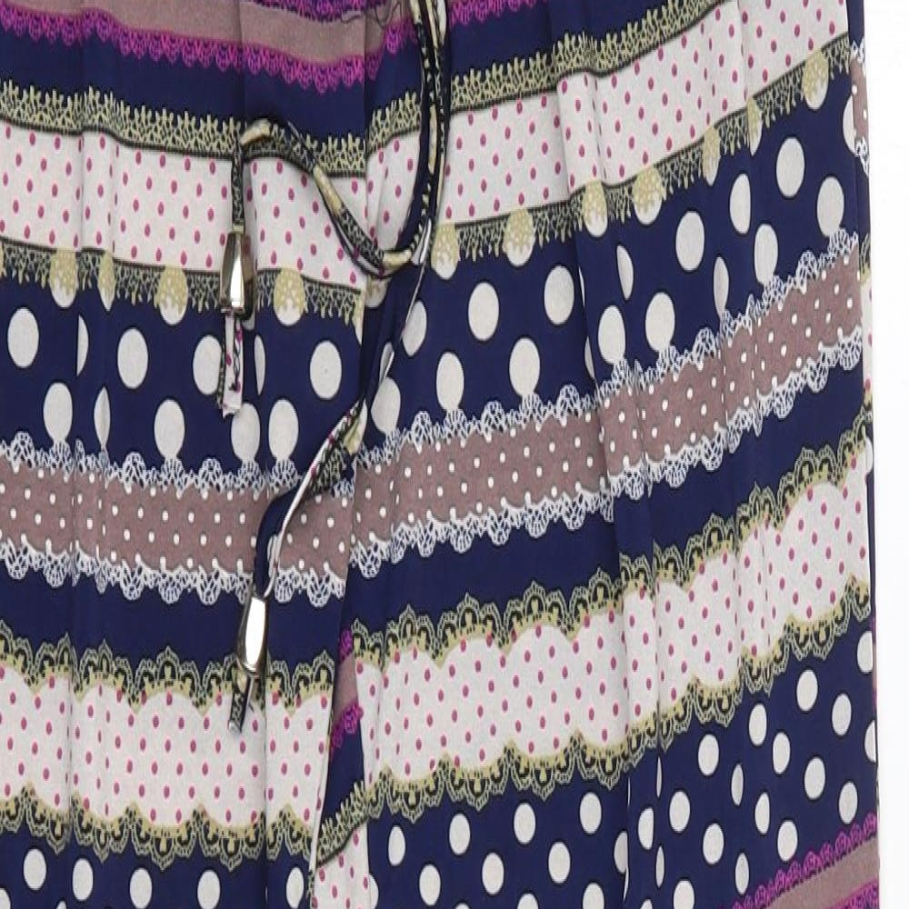 Close-up detail of Conos women’s multicoloured polyester trousers, size M, 31-inch leg regular