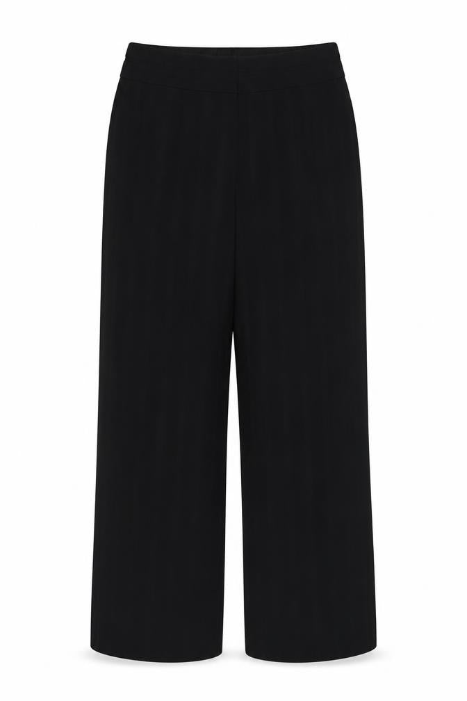 Front view of Marks & Spencer women’s black polyester dress pants trousers, size UK 12, 31-inch leg regular