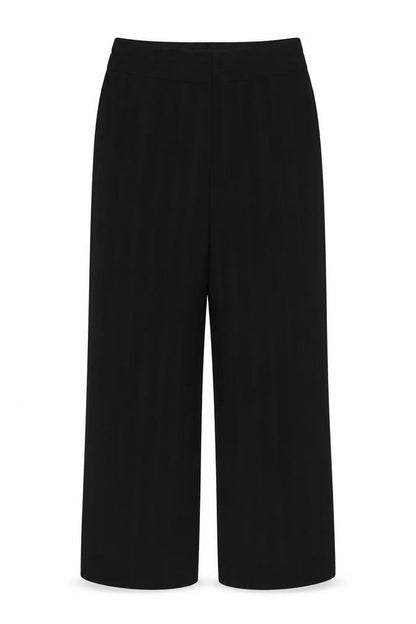 Front view of Marks & Spencer women’s black polyester dress pants trousers, size UK 12, 31-inch leg regular