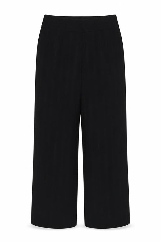 Front view of Marks & Spencer women’s black polyester dress pants trousers, size UK 12, 31-inch leg regular