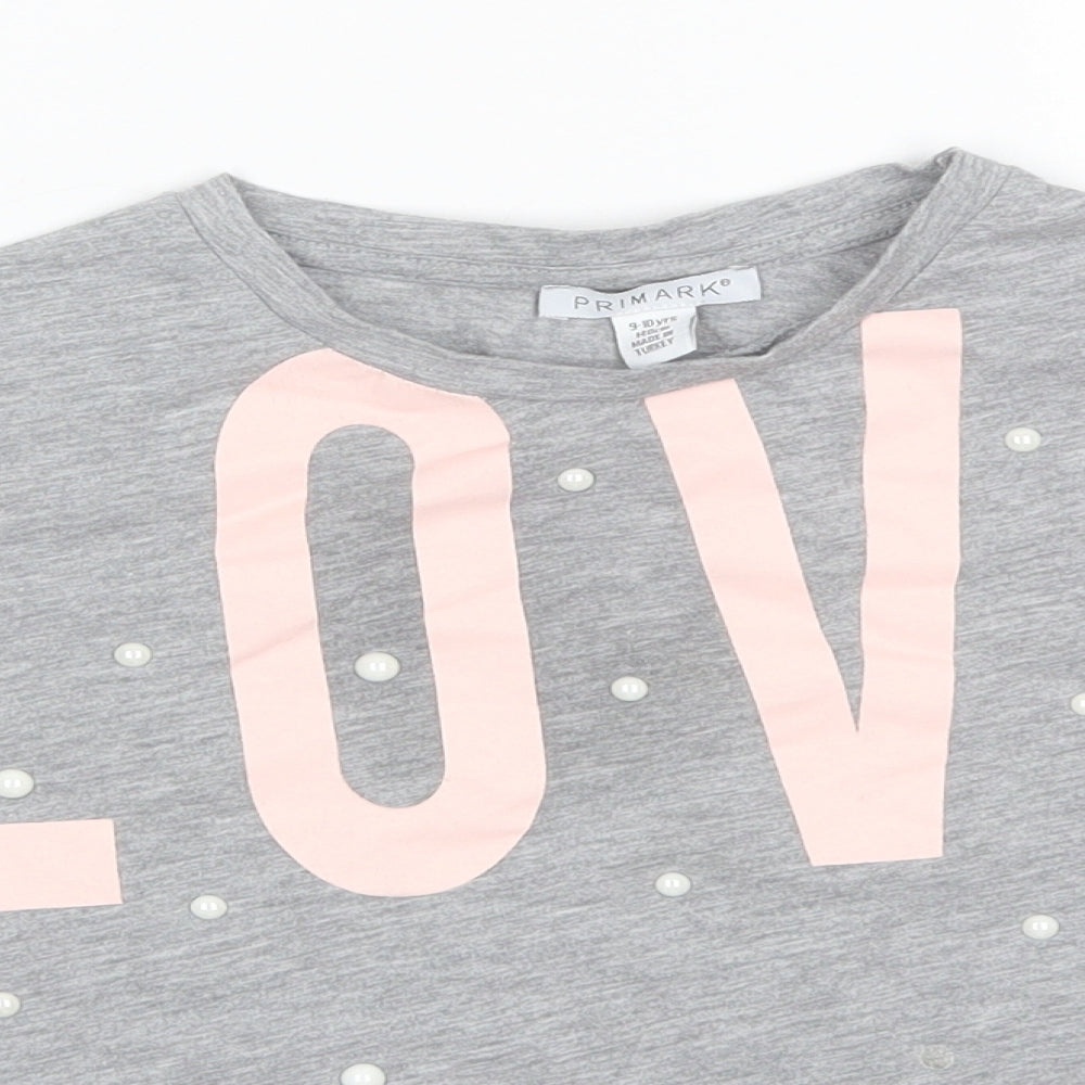 Close-up detail of Primark girls’ grey polyester basic t-shirt, size 9-10, years round neck