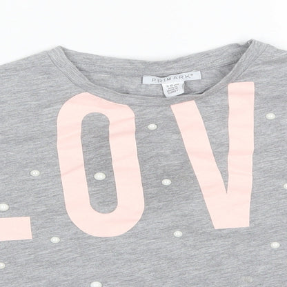 Close-up detail of Primark girls’ grey polyester basic t-shirt, size 9-10, years round neck