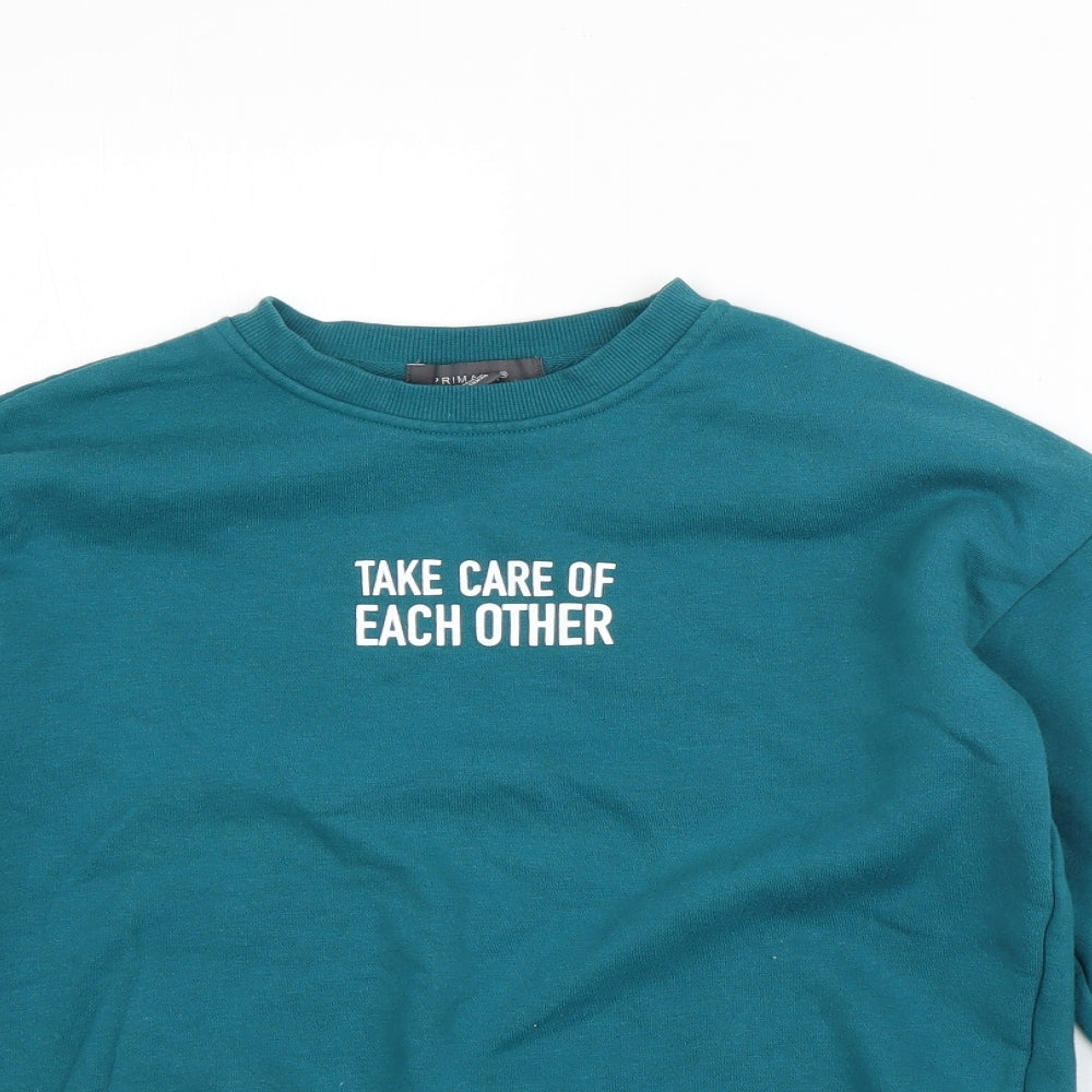 Close-up detail of Primark women’s green polyester pullover sweatshirt, size XS