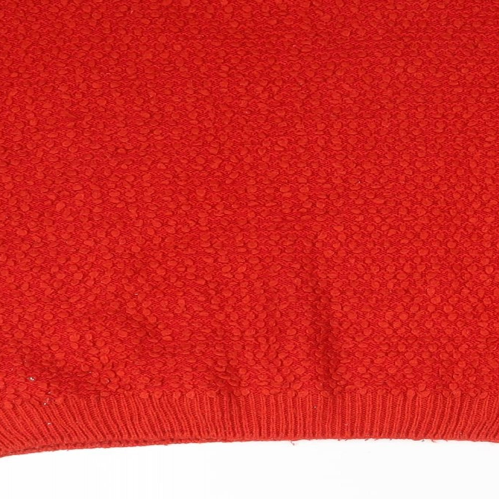 Brand and care label for Primark women’s red acrylic pullover sweatshirt, size M