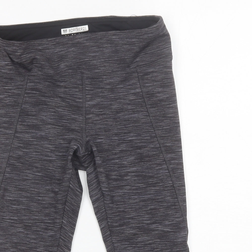 Close-up detail of Forever 21 women’s grey polyester blend compression leggings, size M, 17-inch leg regular