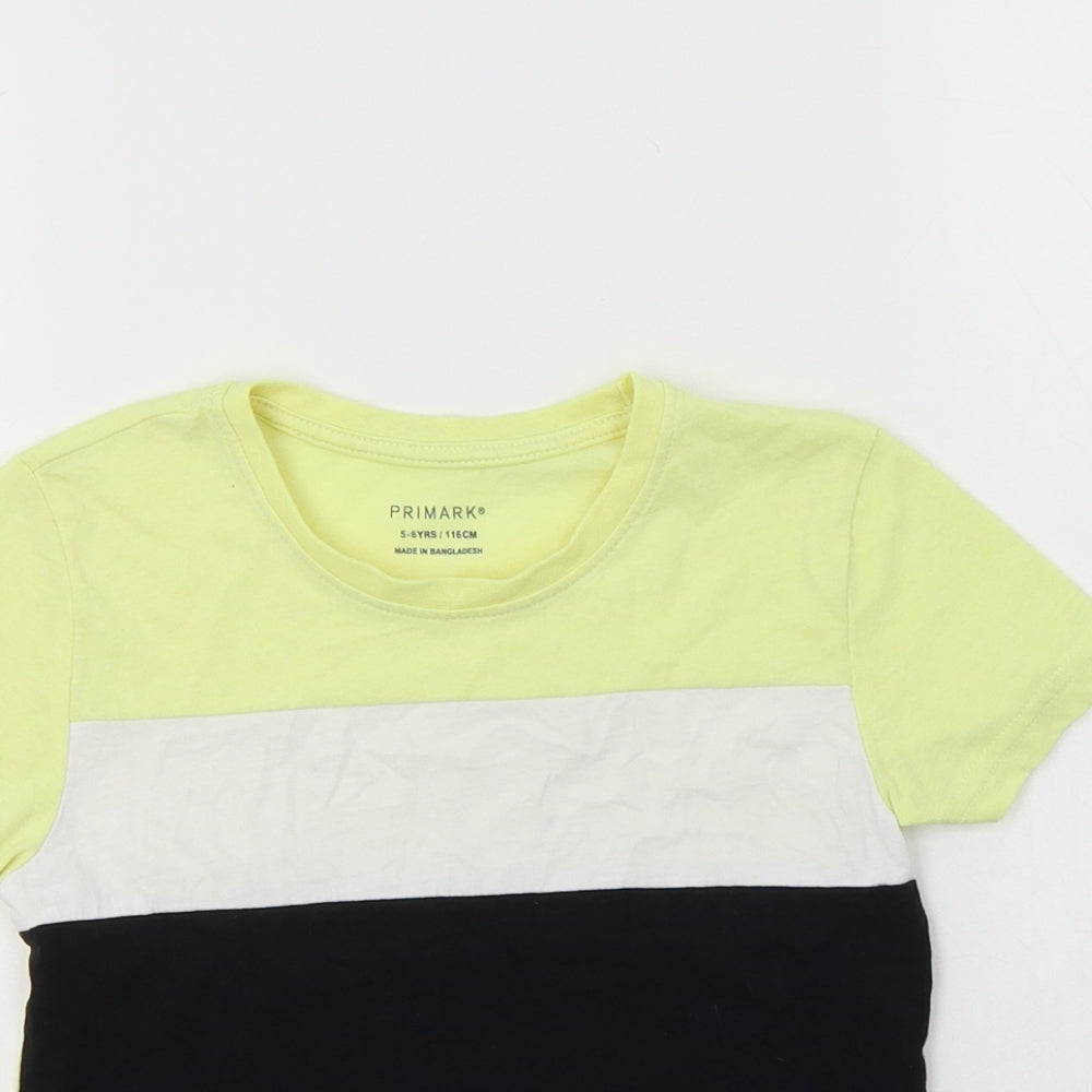 Close-up detail of Primark boys’ yellow colourblock polyester basic t-shirt, size 5-6, years crew neck