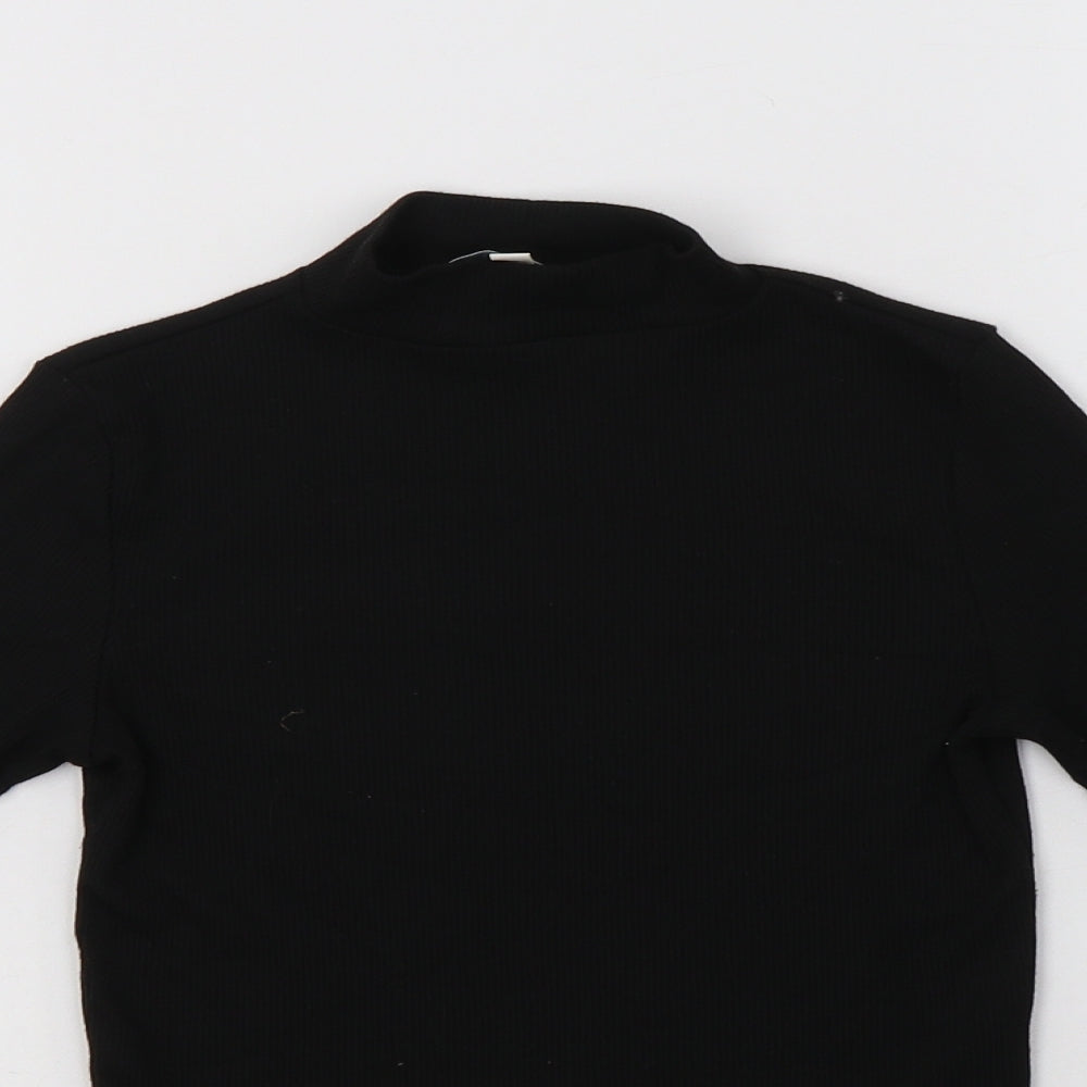 Close-up detail of Miss E-Vie girls’ black polyester basic blouse, size 9-10, years mock neck