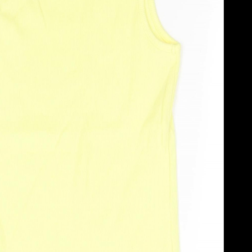 Brand and care label for Next girls’ yellow cotton basic tank, size 7, years round neck
