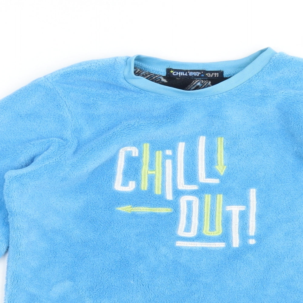 Close-up detail of CHILL OUT boys’ blue solid polyester pyjama top, size 10-11, years - chill out