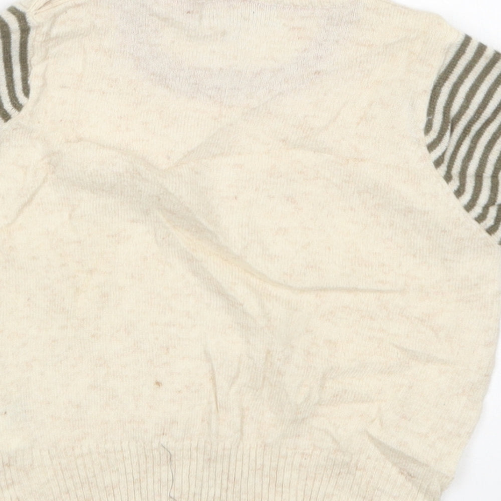 Brand and care label for Freoli boys’ beige round neck wool jumper, size 2, years