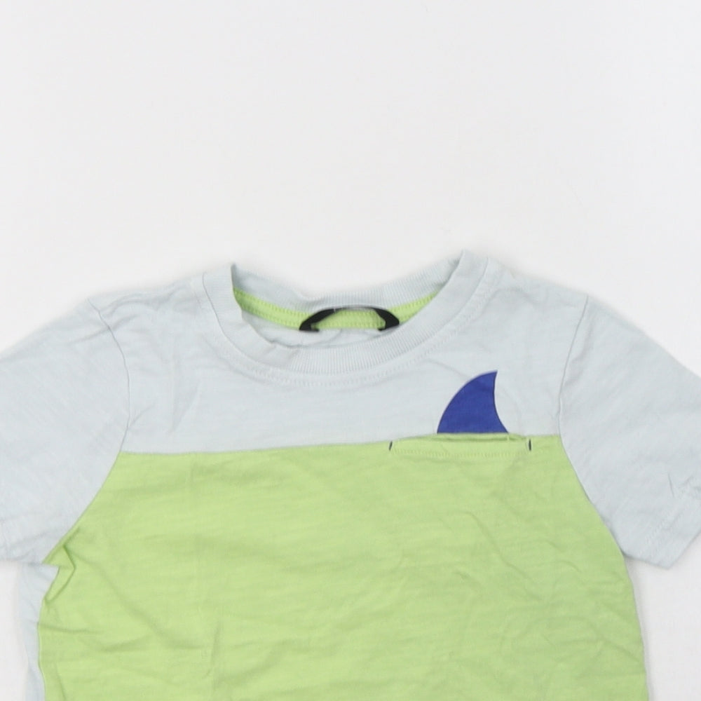 Close-up detail of George boys’ blue colourblock cotton basic polo, size 3-4, years crew neck
