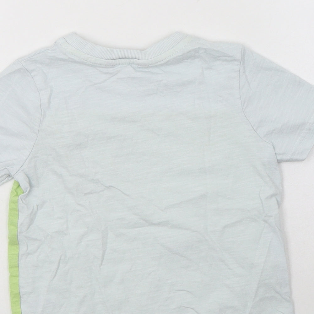 Brand and care label for George boys’ blue colourblock cotton basic polo, size 3-4, years crew neck