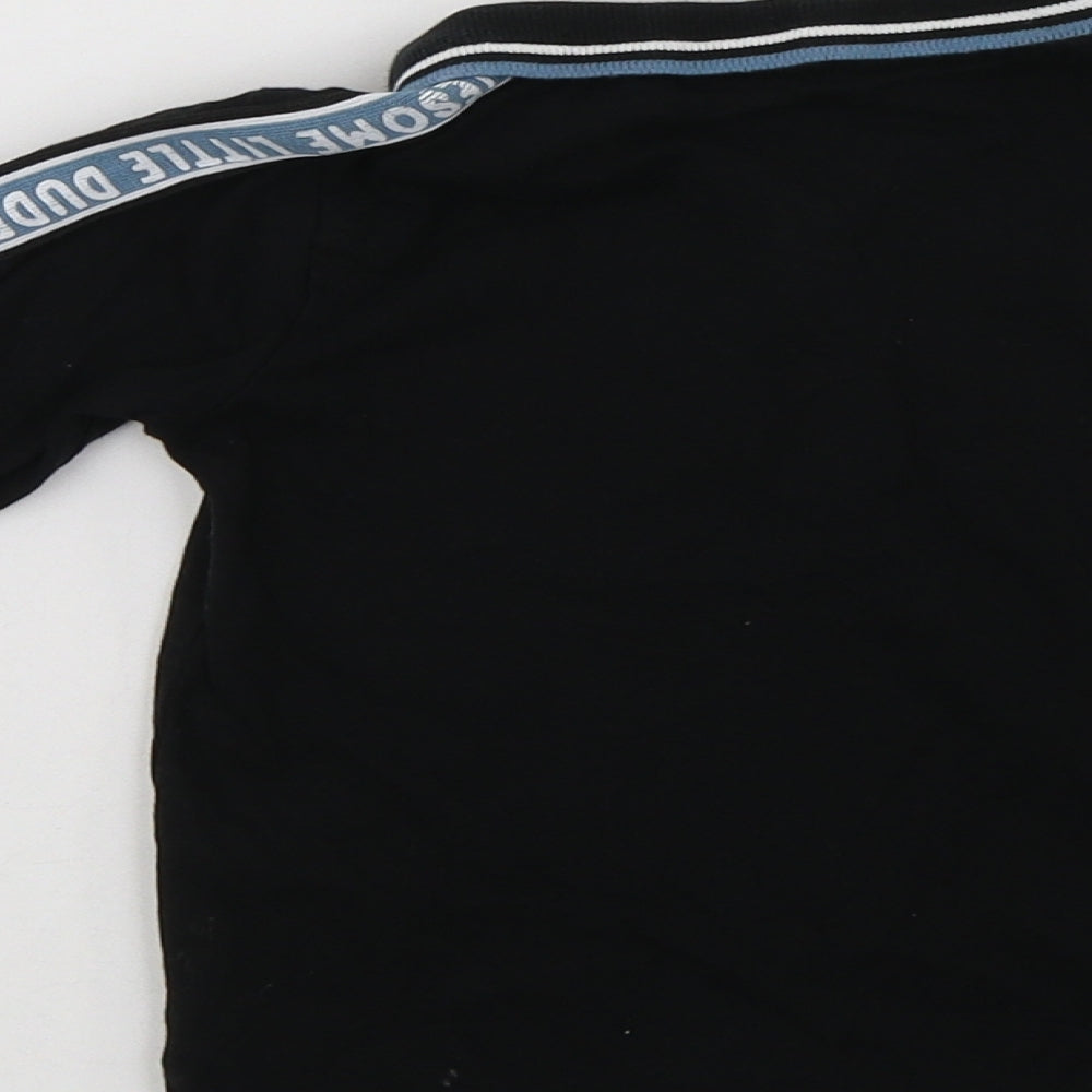 Brand and care label for George Baby Black Cotton Basic Polo, size 12-18, Months Collared Zip