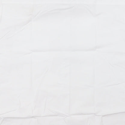 Brand and care label for Sheldon boys’ white basic button-up collared