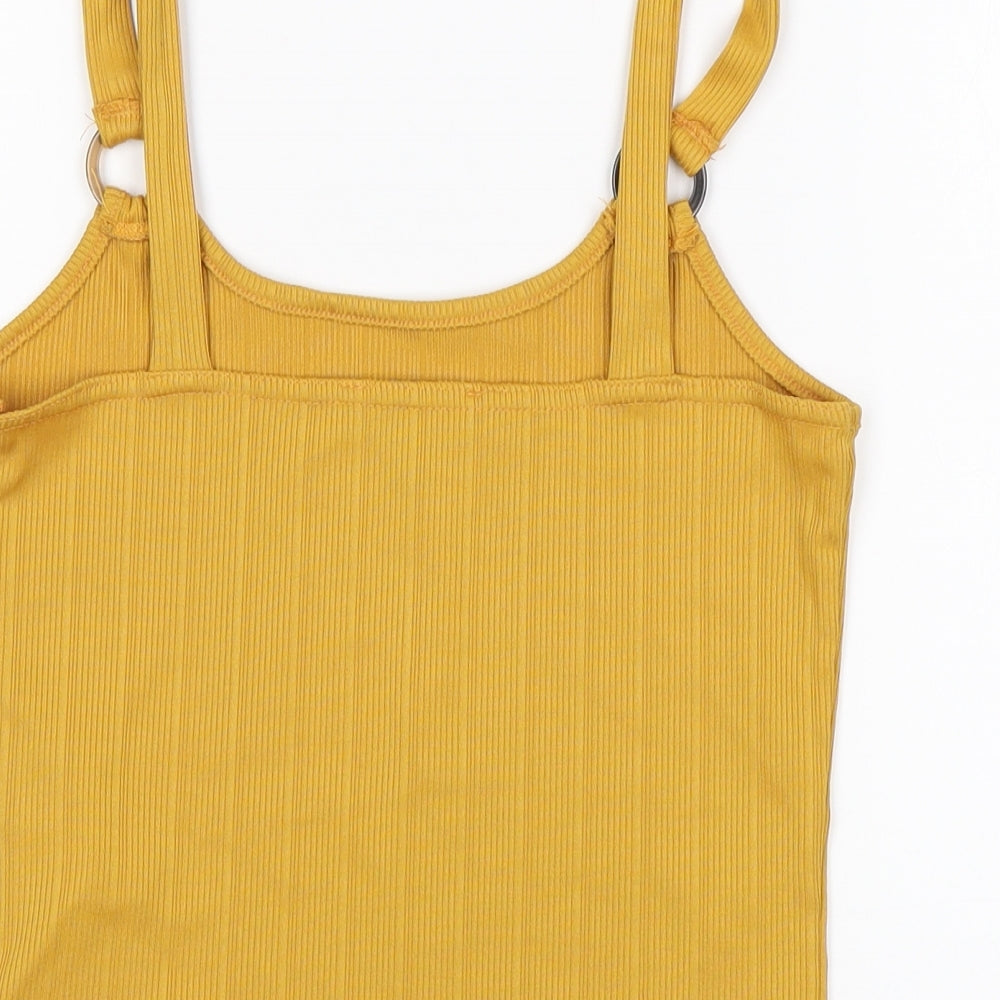 Brand and care label for New Look girls’ yellow polyester basic tank, size 12-13, years round neck