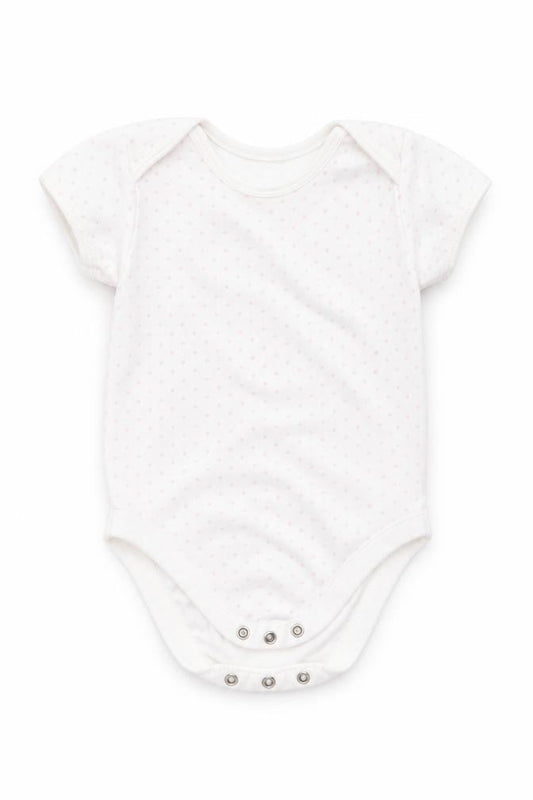 Front view of George girls’ pink polka dot cotton romper one-piece, size 9-12, months snap - heart polka dots