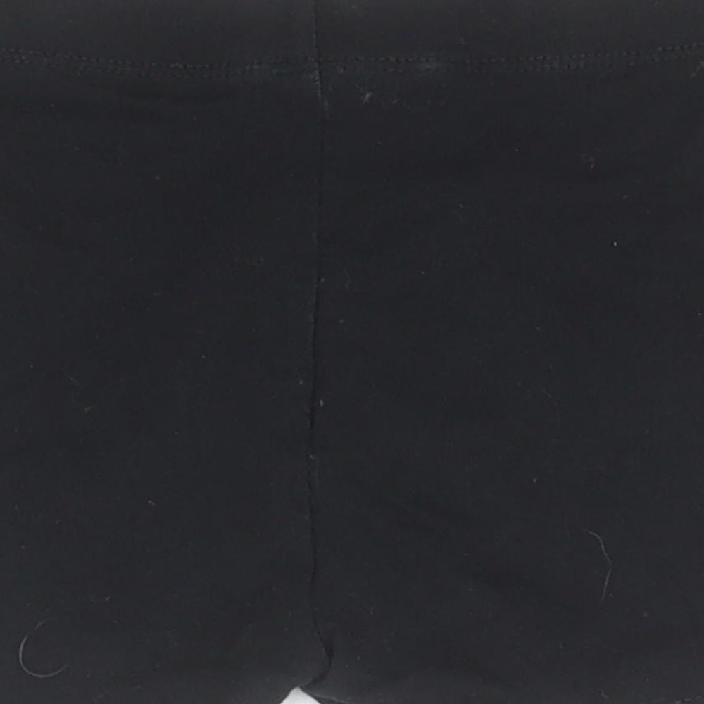 Brand and care label for George boys’ black cotton compression shorts, size 4-5, years regular