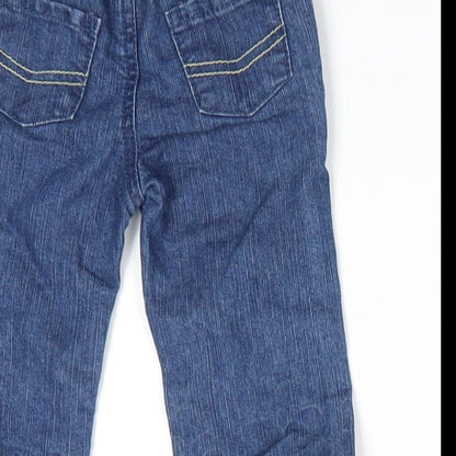 Brand and care label for Early Days boys’ blue cotton jeans, size 3-6, months button - back elastication