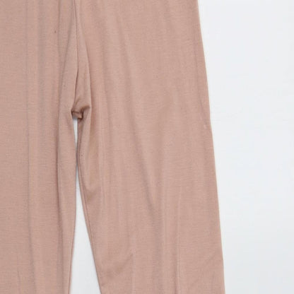 Close-up detail of Missguided women’s pink polyester lounge pants, size UK 4