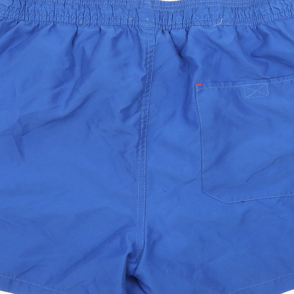 Brand and care label for Burton men’s black polyester athletic shorts, size S, regular drawstring