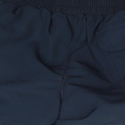 Brand and care label for Lands' End boys’ blue polyester sweat shorts, size 6-7, years regular