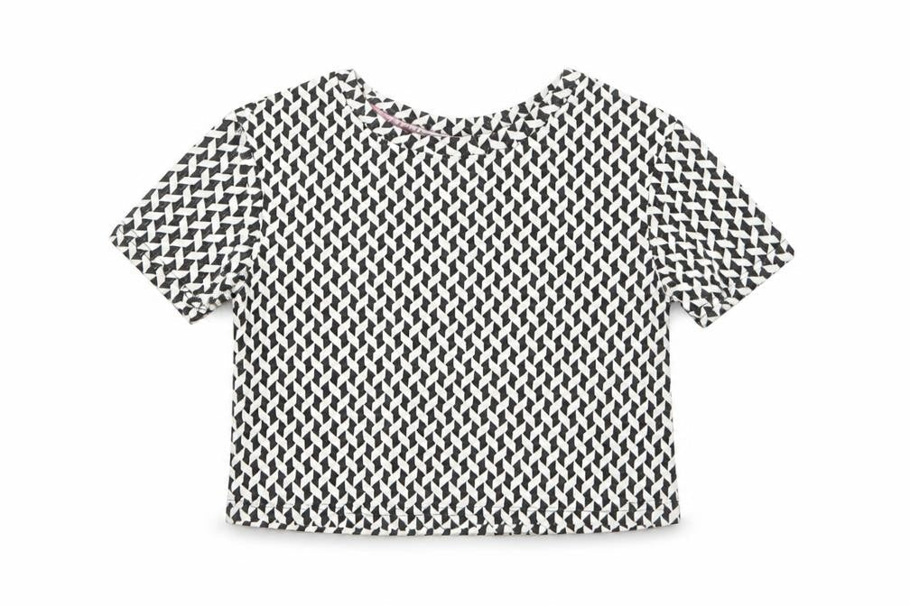 Front view of Matalan girls’ multicoloured geometric polyester basic polo, size 5, years round neck