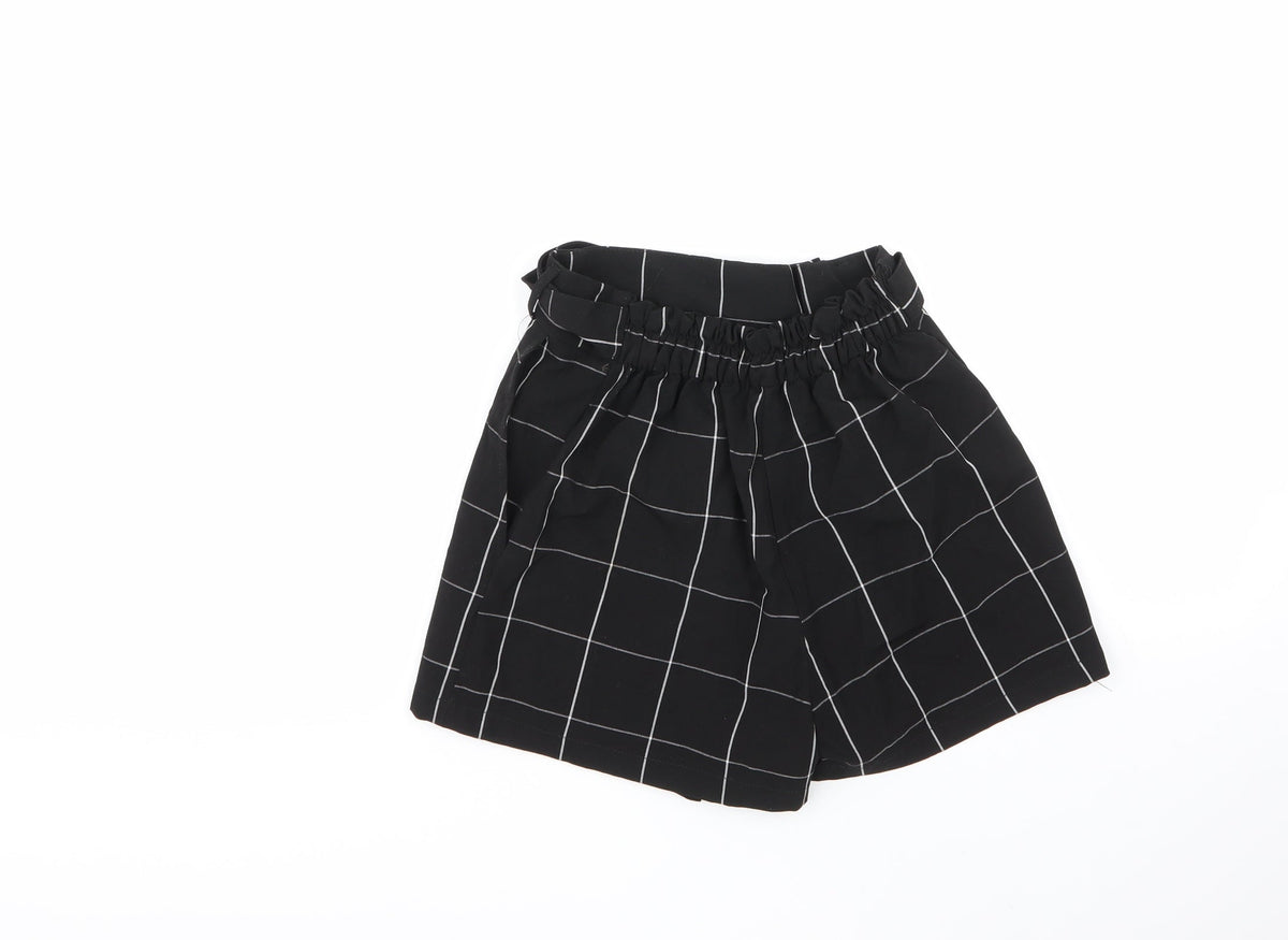 Back view of Pull&Bear women’s multicoloured check vinyl cut-off shorts, size UK 26, 6-inch leg regular