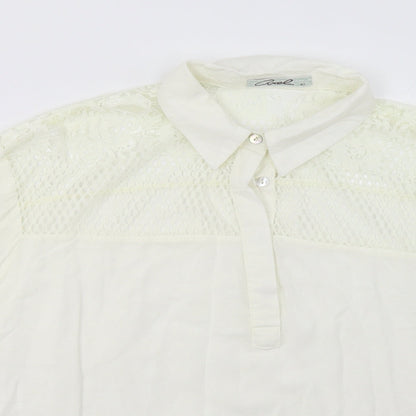 Close-up detail of Axel women’s white viscose basic polo, size UK 14, collared