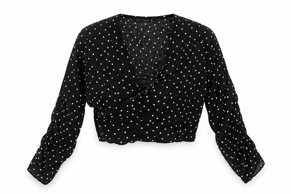 Front view of PRETTYLITTLETHING women’s black polka dot cotton cropped blouse, size UK 10, v-neck