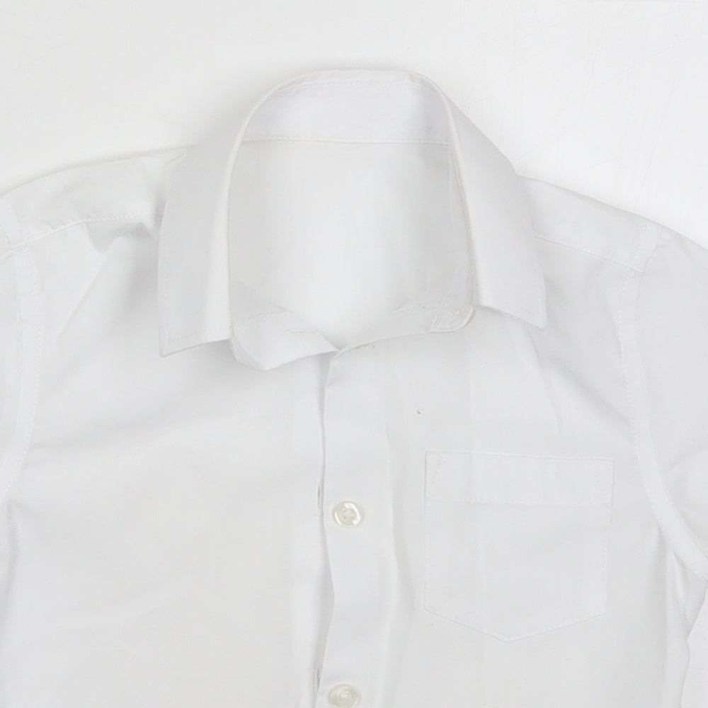Close-up detail of Tu boys’ white polyester basic button-up, size 5, years collared button