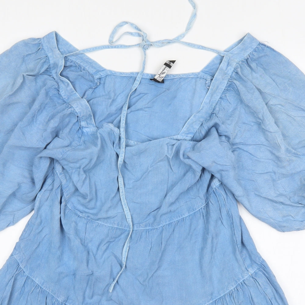 Close-up detail of Influance women’s blue viscose a-line, size UK 8, square neck