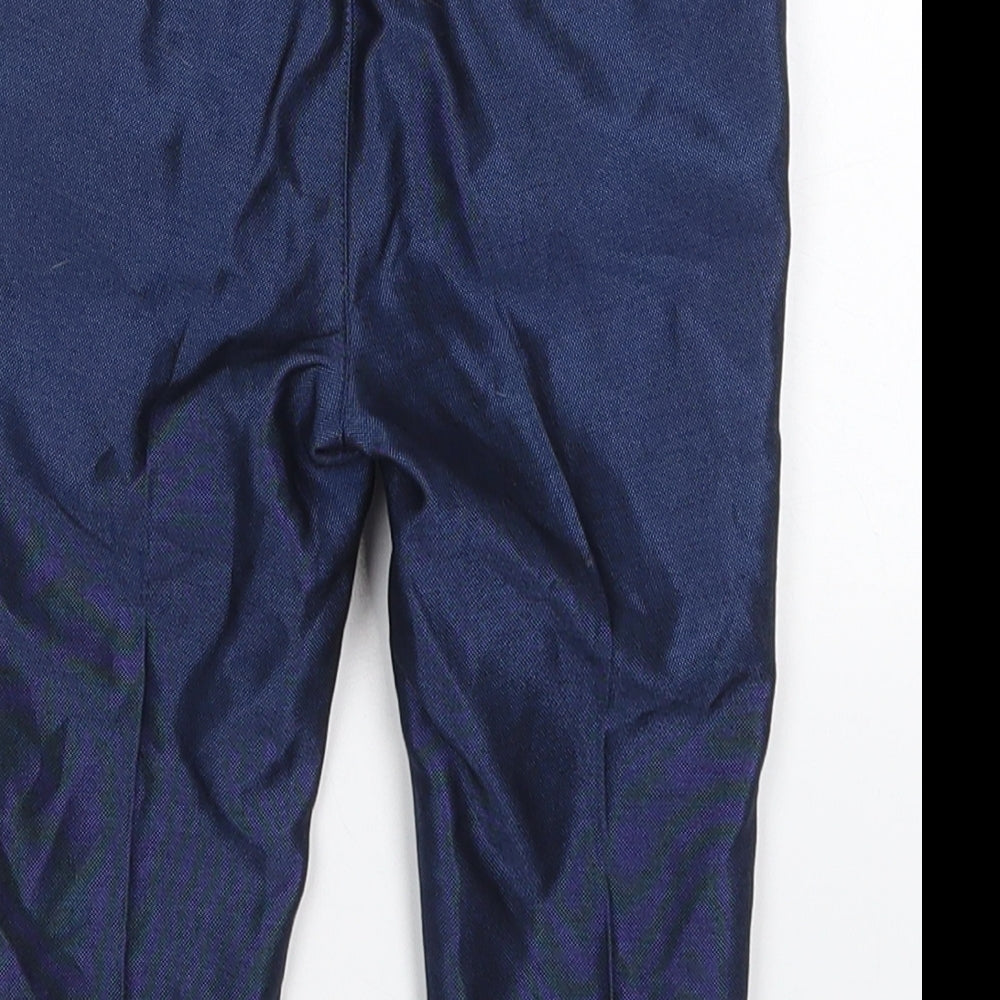 Brand and care label for Monsoon boys’ blue polyester capri trousers, size 6-9, months button